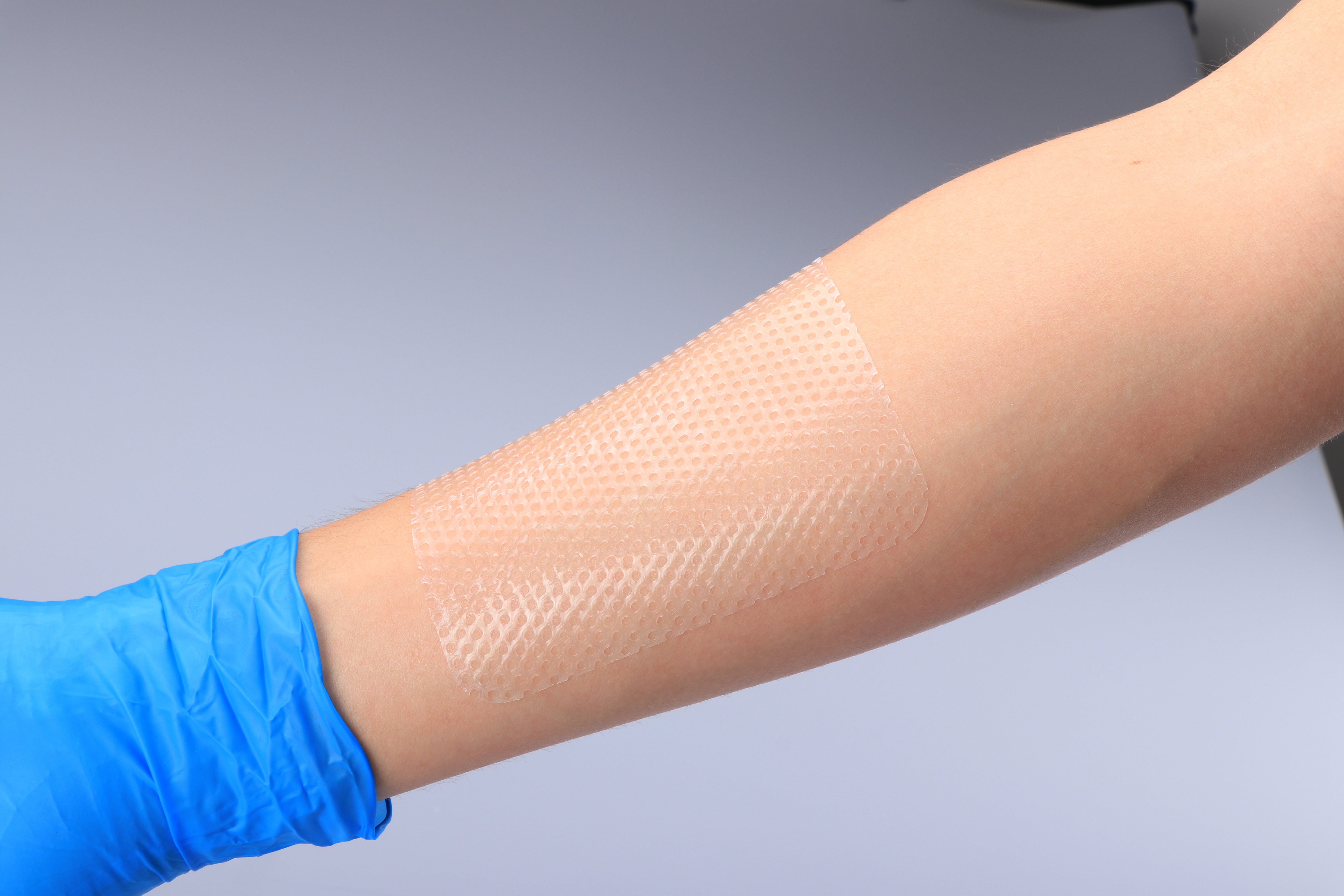 Protección de la piel Adhesión hipoalergénica Capa de contacto de silicona